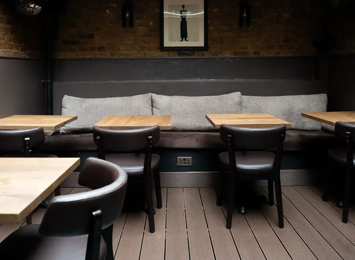 New tables, chairs and banquette seating at Laika Shisha Lounge after renovation