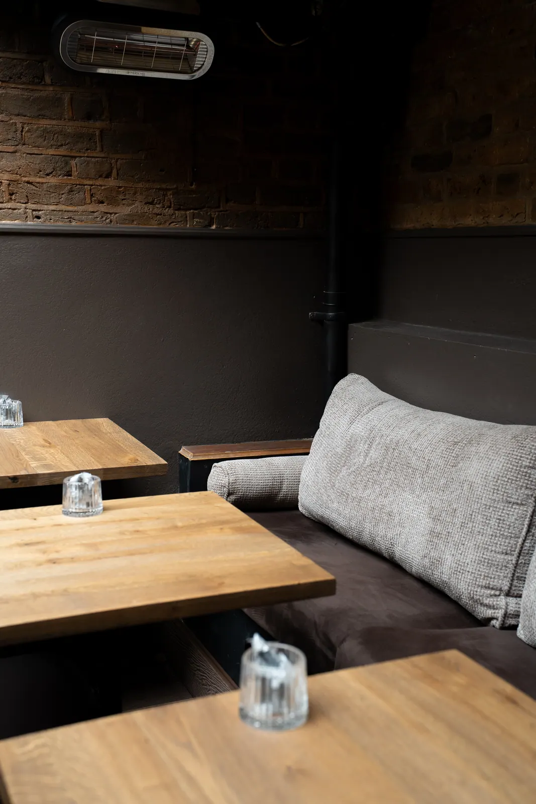 Intimate table setting with soft light at Laika