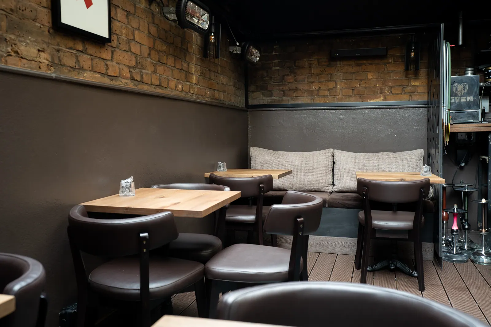 Lounge seating with new floor and chairs at Laika
